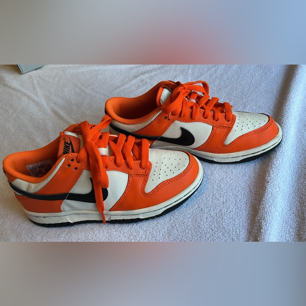 Nike dunks (orange/white and black)